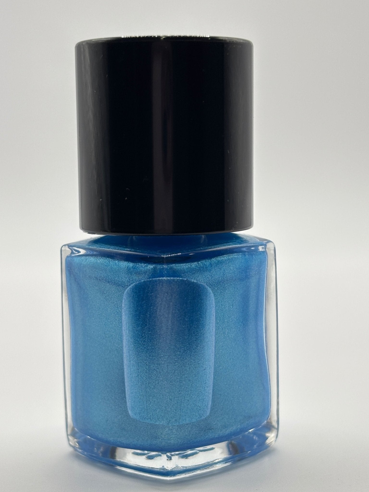 BOTTLE OF DOROTHY WITH FINGERNAIL ON THE BOTTLE