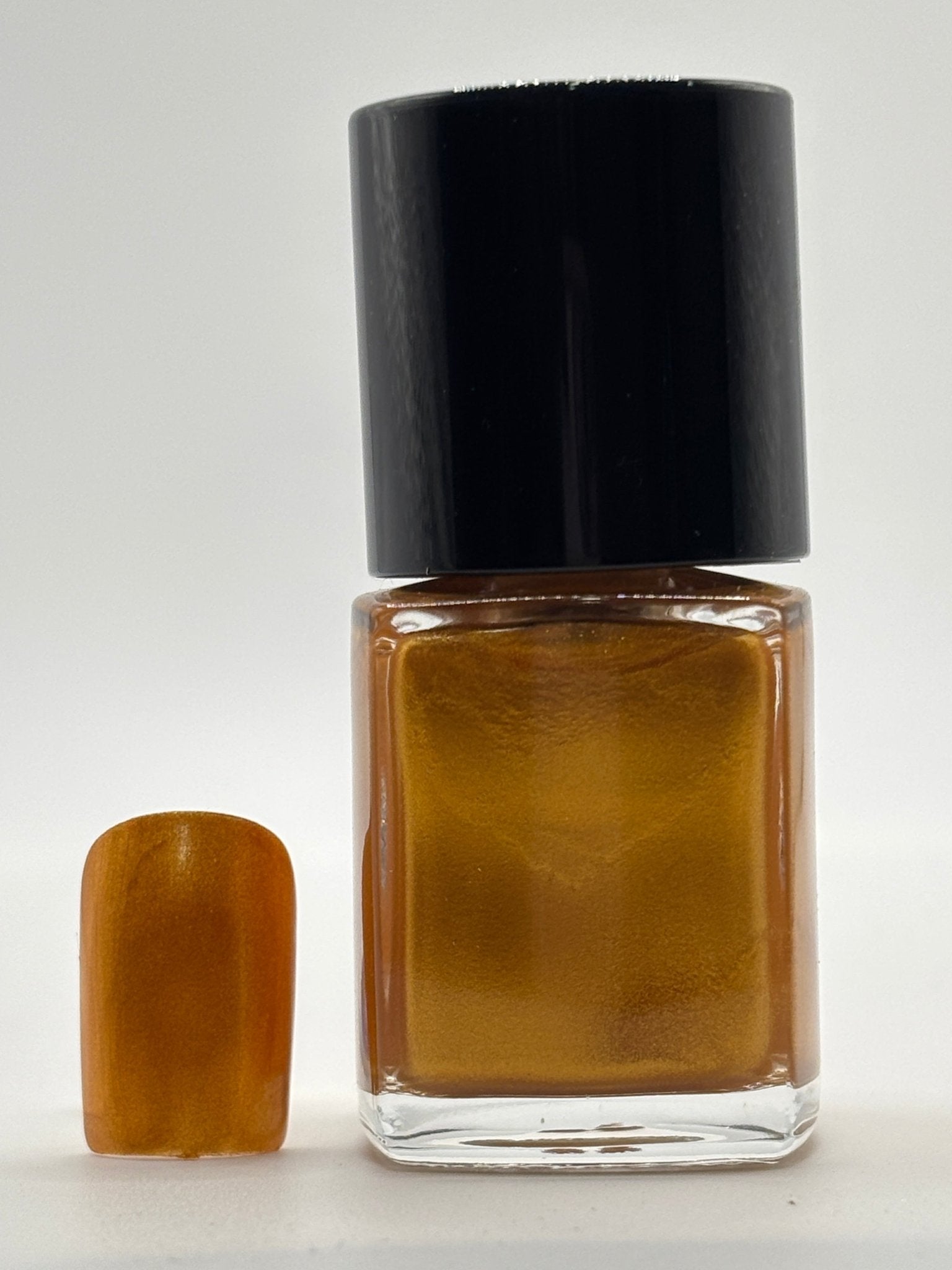 BOTTLE OF ESTHER WITH A FAKE NAIL WITH THE COLOR OF ESTHER
