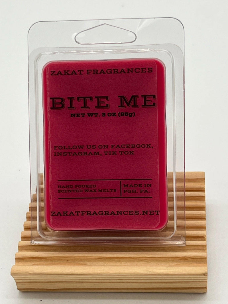 BITE ME PICTURE OF WAX MELT ON TOP OF A SHELF