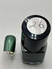 BOTTLE OF DR FRENCH WITH NAIL BESIDE THE BOTTLE WITH THE SAME COLOR AS THE BOTTLE WITH THE NUMBER 26 ON THE BOTTLE