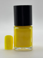 BOTTLE OF GERI NAIL POLISH WITH FAKE NAIL BESIDE IT WITH THE COLOR ON IT