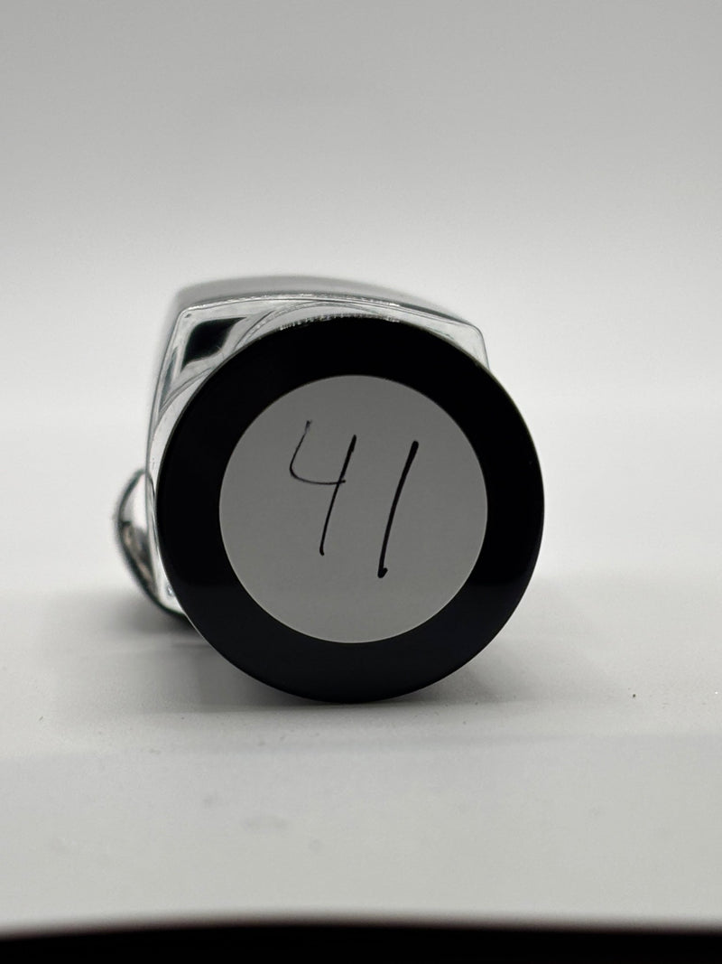 BOTTLE OF NALISA SHOWING THE TOP OF THE BOTTLE WITH THE # 41 ON IT